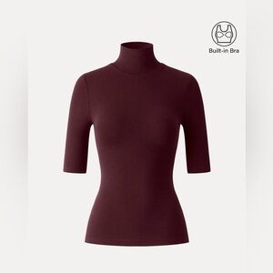 OGL move Brami Mock-neck  elbow sleeve top Ruby
Or Burgundy color. NWT